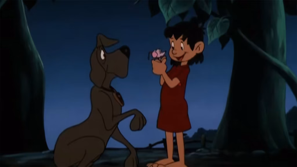 Jack underneath the beanstalk, holding onto a mouse.