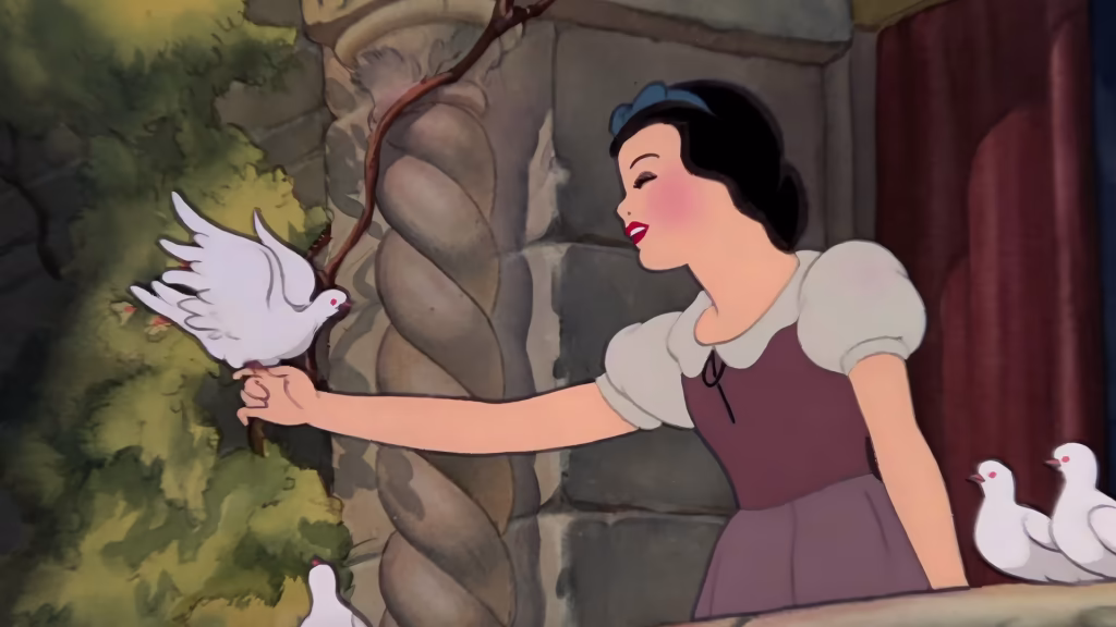 Snow White holding up her hand for a white dove.